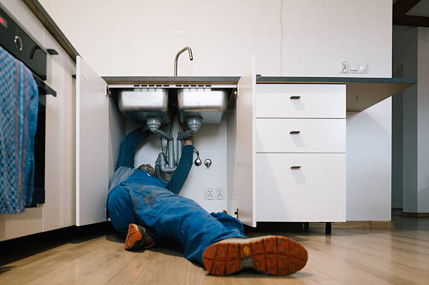 Professional Drain Cleaning technician working in Salamonia, IN